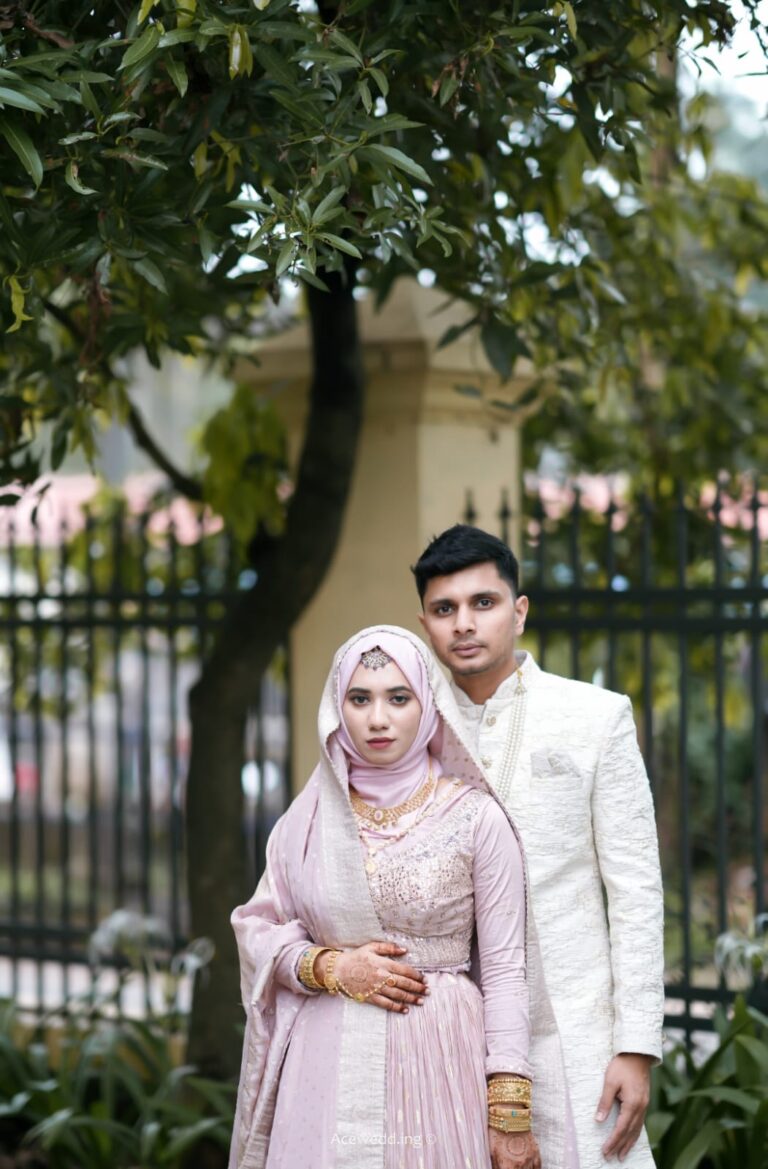 Portrait of a Muslim wedding couple in elegant traditional attire, photographed by Aceoclock wedding photography company in Kerala
